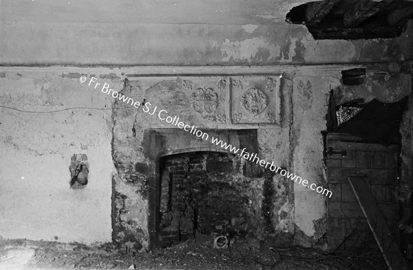 THE CASTLE  DAMAGED FIREPLACE IN WEST ROOM OF GROUND FLOOR